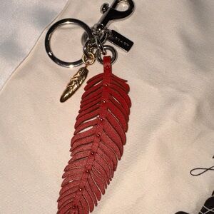 Coach Red Feather Keychain with Gold Charm